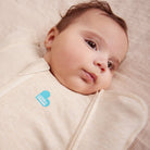 Love to Dream Swaddle Up™ Early Roller Transition Bag in oatmeal, 1.0 TOG, featuring a cozy, sleeveless design for gentle baby sleep transition.