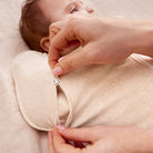 Love to Dream Swaddle Up™ Early Roller Transition Bag in oatmeal, soft fabric with zipper closure for safe sleep.