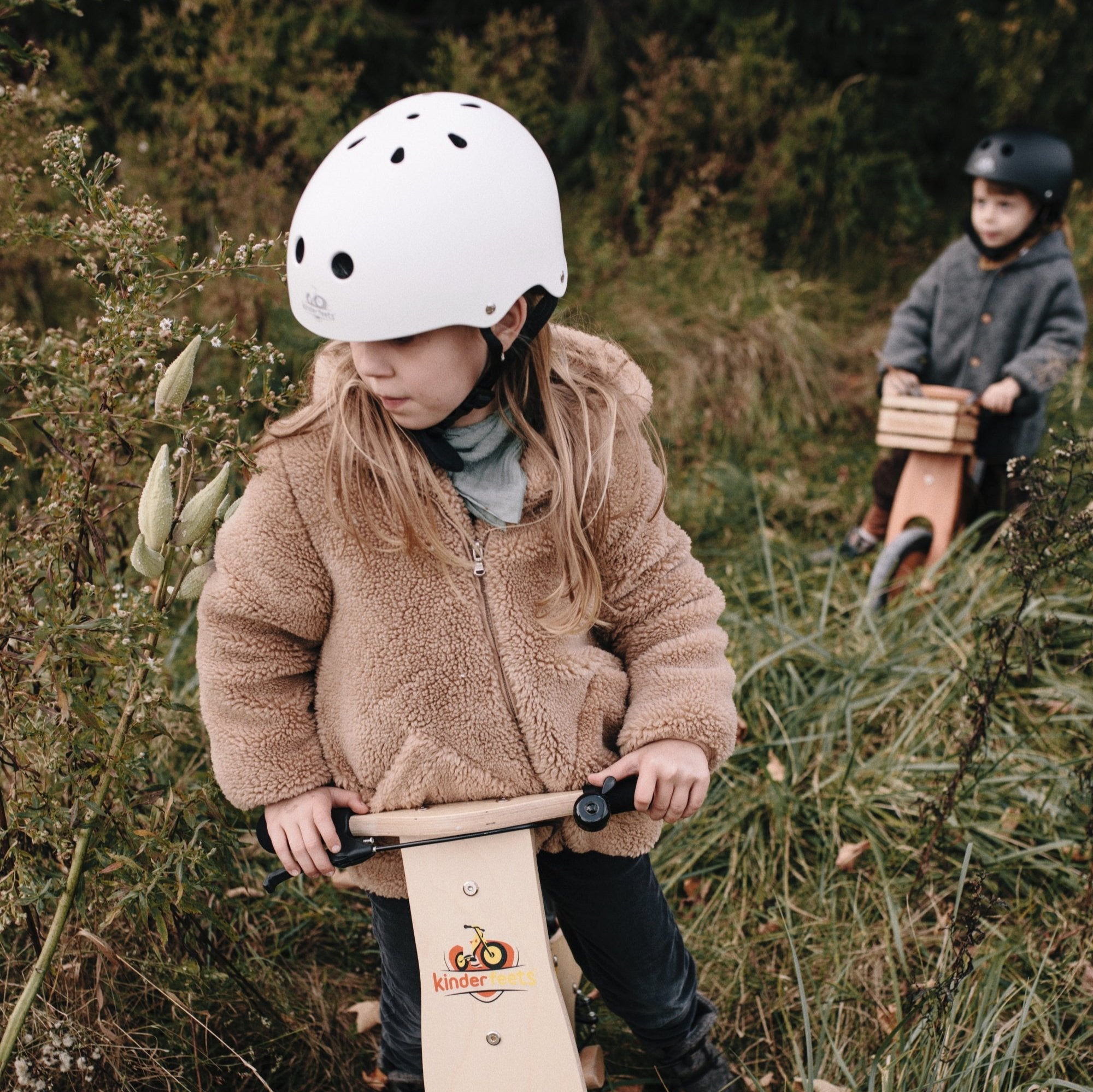 Kinderfeets toddler bike helmet in matte finish, lightweight helmet with adjustable straps and ventilation for young riders.