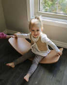 Kinderfeets Kinderboard Lite balance board in natural wood finish, designed for stability and fun for kids.