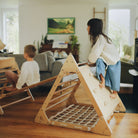 Large Kinderfeets Pikler Triangle climbing toy with wooden frame and colorful rungs for toddler balance and coordination.