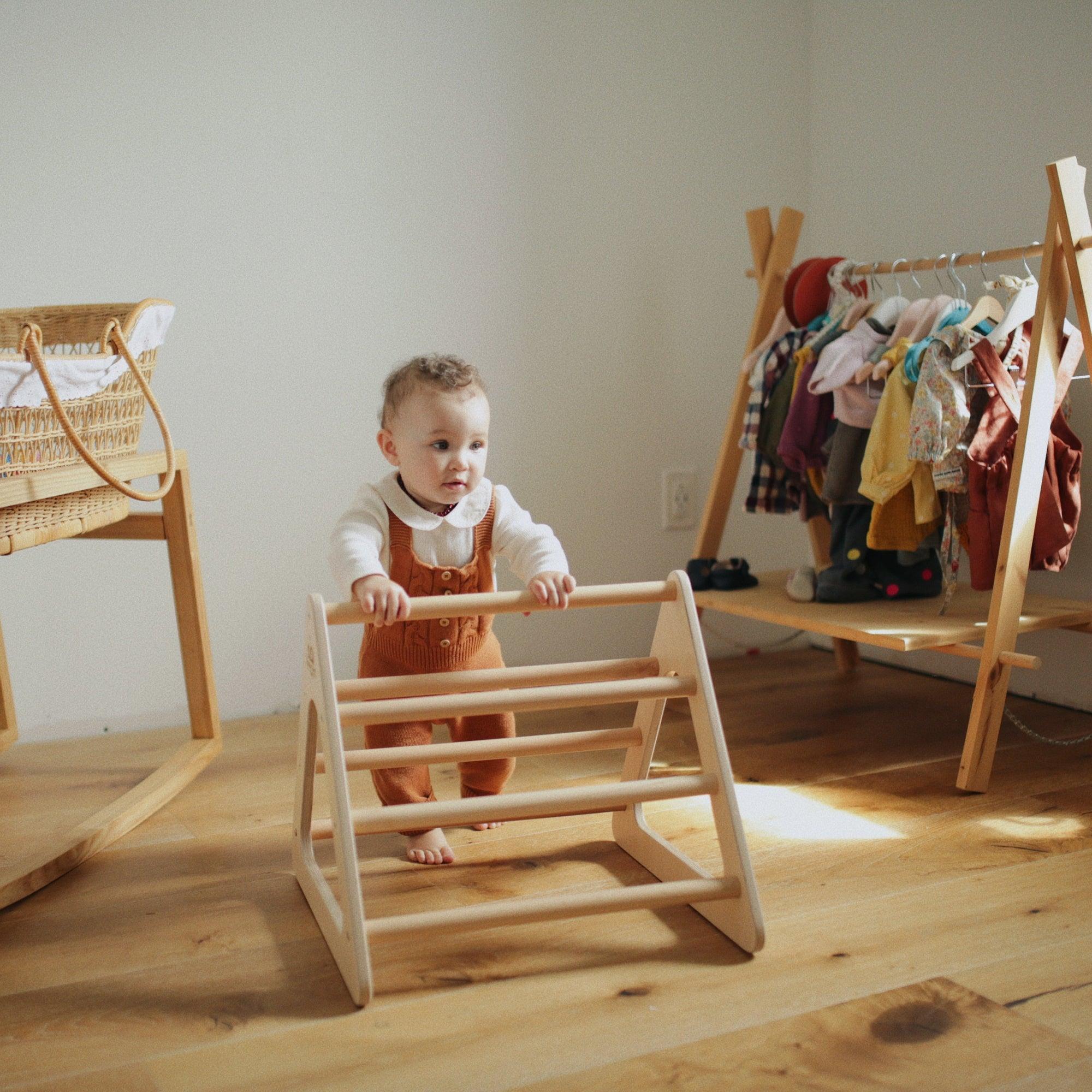 Kinderfeets Pikler Triangle small climbing toy with wooden frame and colorful rungs for toddler play and development.