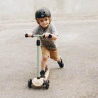 Kinderfeets Kinder Scooter in rose color, a child's bike and scooter hybrid with a sleek design and sturdy build.
