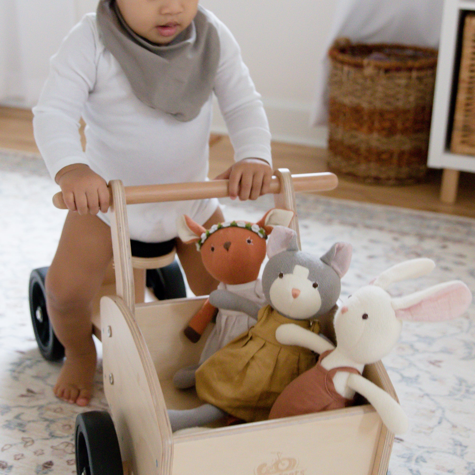 Kinderfeets Ride-on Cargo Cart toy for kids, featuring colorful design and sturdy wheels for outdoor play and transportation.