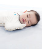 Love to Dream Swaddle Up™ Organic 1.0 TOG in cream, a cozy baby swaddle with a soft, breathable fabric for comfortable sleep.