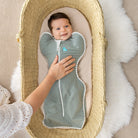 Love to Dream Swaddle Up™ Original 1.0 TOG in olive, a cozy swaddle blanket with the brand logo visible, designed for comfortable baby sleep.