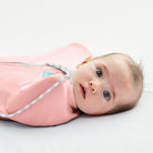 Love to Dream Swaddle Up™ Original 1.0 TOG in Dusty Pink, soft fabric swaddle with arms in, designed for baby sleep comfort.