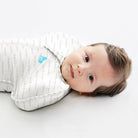 Love to Dream Swaddle Up™ Original 1.0 TOG swaddle for babies, featuring a soft fabric and open-arm design for comfortable sleep.