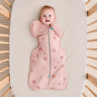 Love to Dream Swaddle Up™ Warm 2.5 TOG in Little Dreamer Dusty Pink, soft fabric with baby's arms in a snug swaddle position.