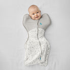 Love to Dream Swaddle Up™ Extra Warm 3.5 TOG in Moonlight White, soft fabric swaddle for babies, laid flat showing the material.