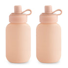 Mushie silicone puree pouch 2-pack in blush, soft silicone dinnerware for baby food, featuring resealable spouts and flexible design.