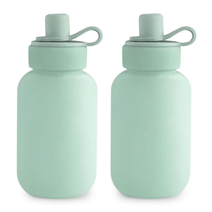 Mushie silicone puree pouch 2-pack in Cambridge Blue, soft reusable dinnerware for babies and toddlers.