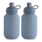 Mushie silicone puree pouch set with two Cambridge Blue reusable dinnerware pouches for baby food storage and feeding.