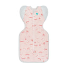 Love to Dream Swaddle Up Transition Bag Lite 0.2 TOG in Daredevil Bunny Pink, showing the soft pink fabric and secure zipper design.
