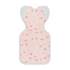 Love to Dream Swaddle Up Transition Bag Lite 0.2 TOG in Daredevil Bunny Pink, showing soft pink fabric and zipper closure.