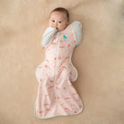 Love to Dream Swaddle Up™ Transition Bag Lite 0.2 TOG in Daredevil Bunny Pink, showing soft pink fabric and secure shoulder openings.