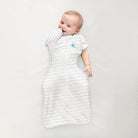 Love to Dream Swaddle Up Transition Bag 1.0 TOG for babies, showing soft fabric and zipper closure in a cozy sleep environment.