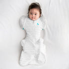 Love to Dream Swaddle Up Transition Bag 1.0 TOG in light gray, featuring a zipper closure and soft fabric for comfortable sleep.