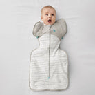 Love to Dream Swaddle Up Transition Bag Warm 2.5 TOG in white, featuring a cozy, sleeveless design for safe baby sleep.