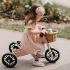 Kinderfeets Tiny Tot Plus pink trike and balance bike for young children, featuring a sturdy frame and ergonomic design.