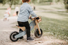Kinderfeets Tiny Tot Plus Slate Blue trike and balance bike for toddlers, featuring a sturdy design and colorful accents.