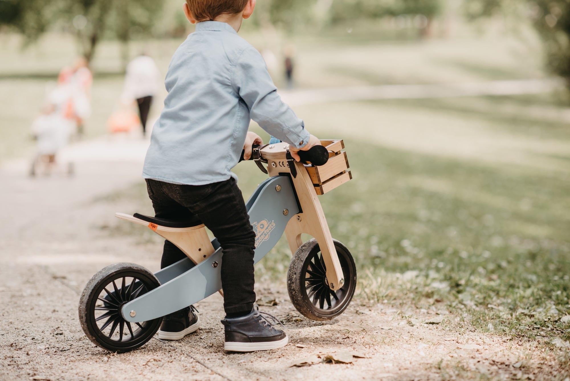 Kinderfeets Tiny Tot Plus Slate Blue trike and balance bike for toddlers, featuring a sturdy design and colorful accents.