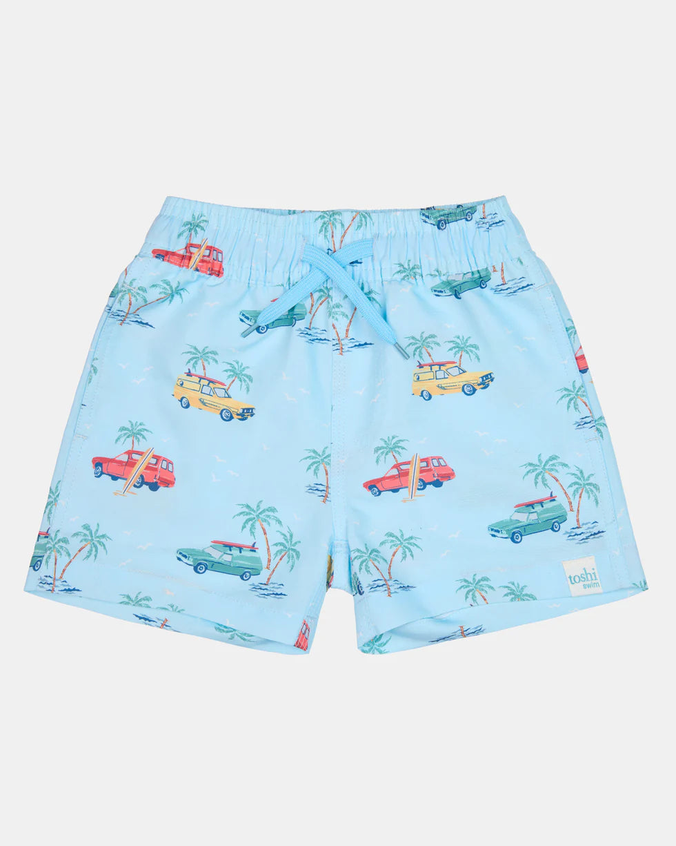 Toshi Splash Swim Boardies for men featuring a vibrant sky blue color and quick-drying, lightweight swim bottoms for beach or pool.