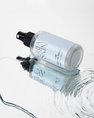 Oria Skin Rose Calming Toner 100ml bottle with floral design, showcasing a soothing skincare product for sensitive skin.