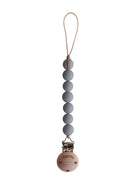Mushie Cleo Pacifier Clip in Halo Stone, a stylish silicone pacifier case with a secure clip and modern design.