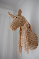 Rattan unicorn wall mount by Inkah Limited featuring a handcrafted natural finish and whimsical unicorn design for home decor.