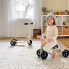 Kinderfeets Tiny Glider toy in vibrant colors, designed for young children to safely ride and develop balance skills.