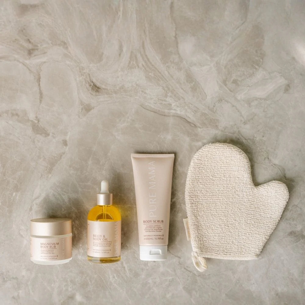 Pure Mama Pregnancy Care Set featuring belly oil, magnesium body rub, and body scrub for women’s prenatal skincare.