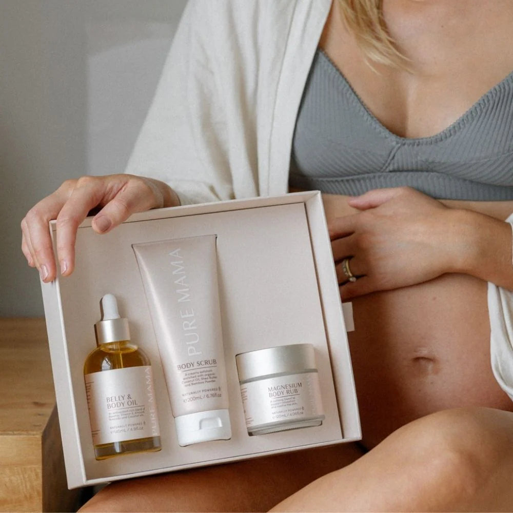 Pure Mama Pregnancy Care Set featuring belly and body oils, magnesium rub, and body scrub for women’s pregnancy skincare.