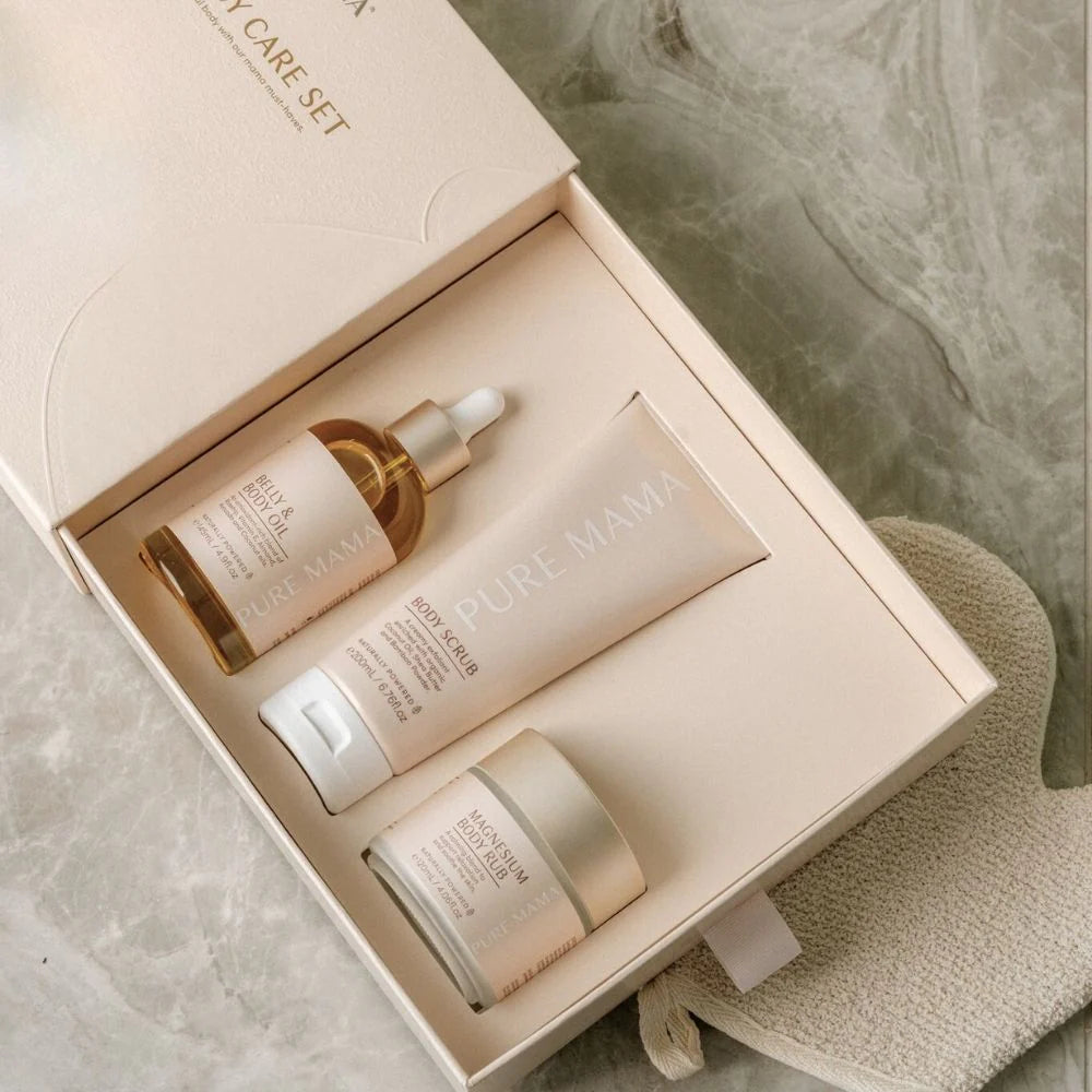 Pure Mama Pregnancy Care Set including belly oil, magnesium rub, and body scrub, designed for women’s prenatal skincare.