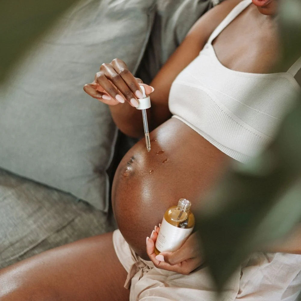 Pure Mama Pregnancy Care Set with belly and body oil, magnesium body rub, and exfoliating body scrub for women during pregnancy.