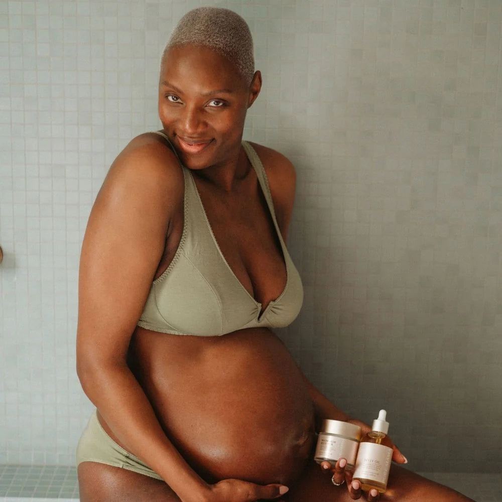 Pure Mama Pregnancy Care Set with belly and body oils, magnesium body rub, and exfoliating body scrub for women during pregnancy.