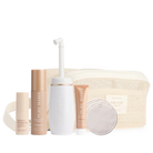 Pure Mama postpartum recovery set including perineal massage oil, nipple butter, nursing pads, peri wash bottle, and post-birth spray.