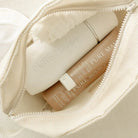 Pure Mama postpartum recovery set including nipple butter, nursing pads, peri-wash bottle, and post-birth spray for women care.