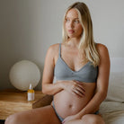 Pure Mama Belly & Body Oil for women, featuring a 145ml bottle of stretch mark prevention and firming skincare.