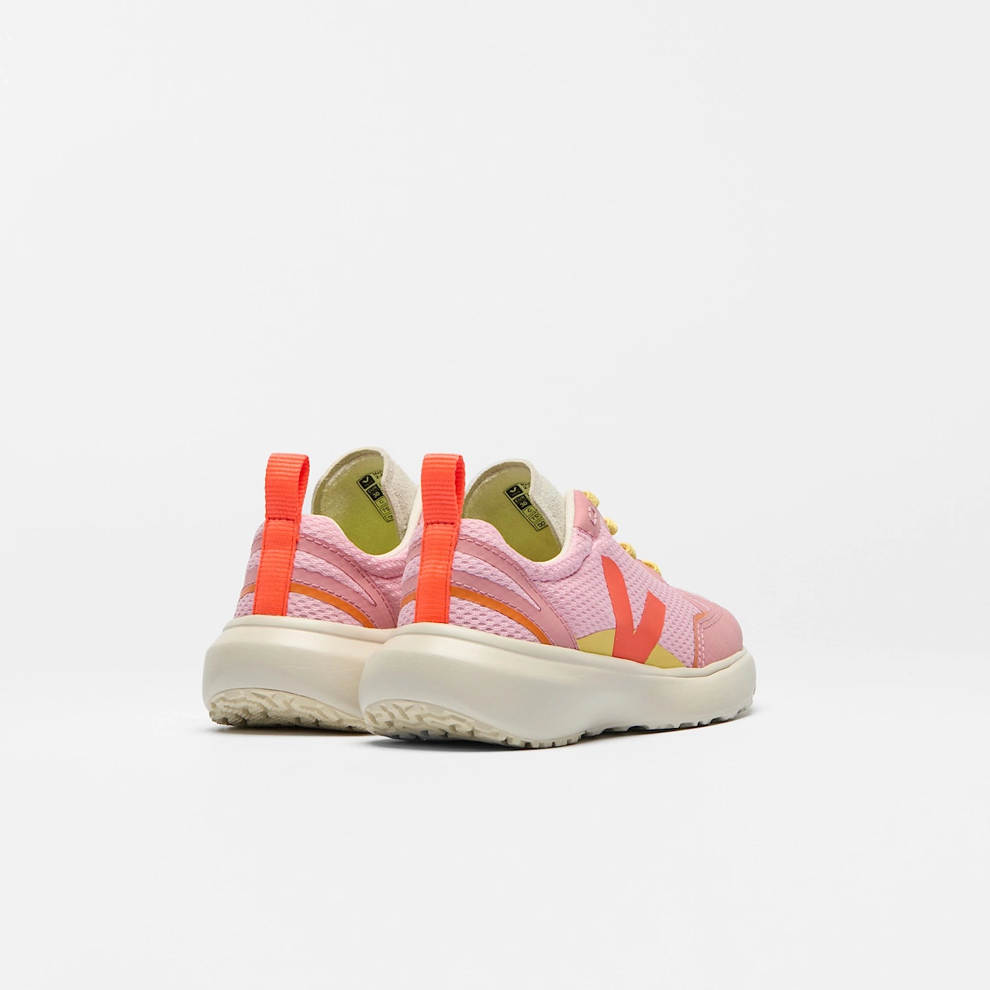 VEJA Canary Light Alveomesh vegan sneakers in Guimauve Orange Fluro with pink accents, lightweight and breathable shoe design.