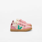 Pink VEJA Small V-90 leather sneakers with Petale Mary Tag, featuring organic leather and sleek design.