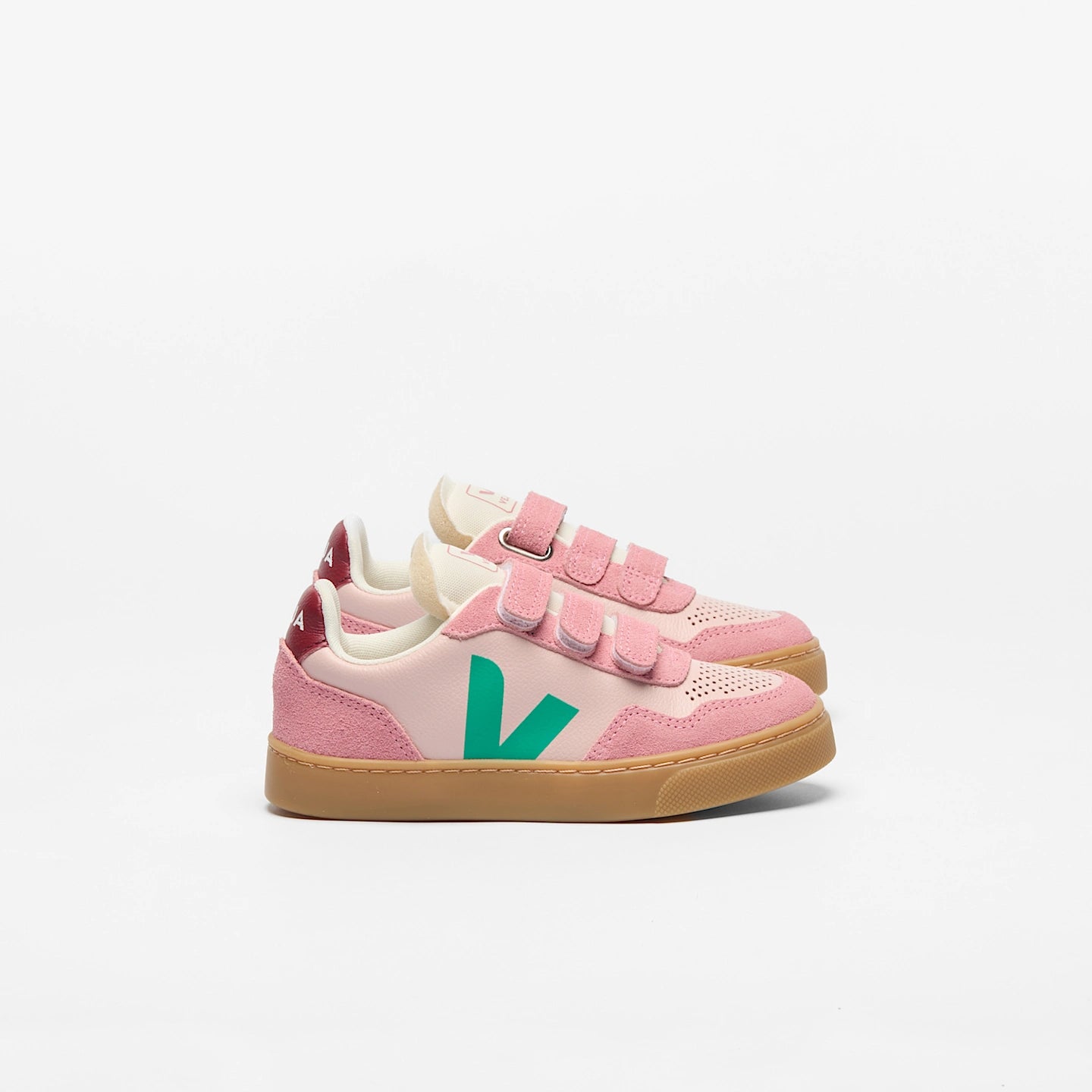 Pink VEJA Small V-90 leather sneakers with Petale Mary Tag, featuring organic leather and sleek design.