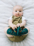 Lamington Wanaka Merino Wool Crew Socks displayed on a foot, showcasing soft, warm knit fabric ideal for outdoor wear.