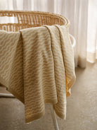GROWN Organic Knit Baby Blanket in River color, soft and cozy for infants, made from organic materials, displayed on a neutral background.