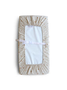 Mushie Rainbow changing pad cover with colorful rainbow pattern, soft fabric, and secure fit for baby change mats.