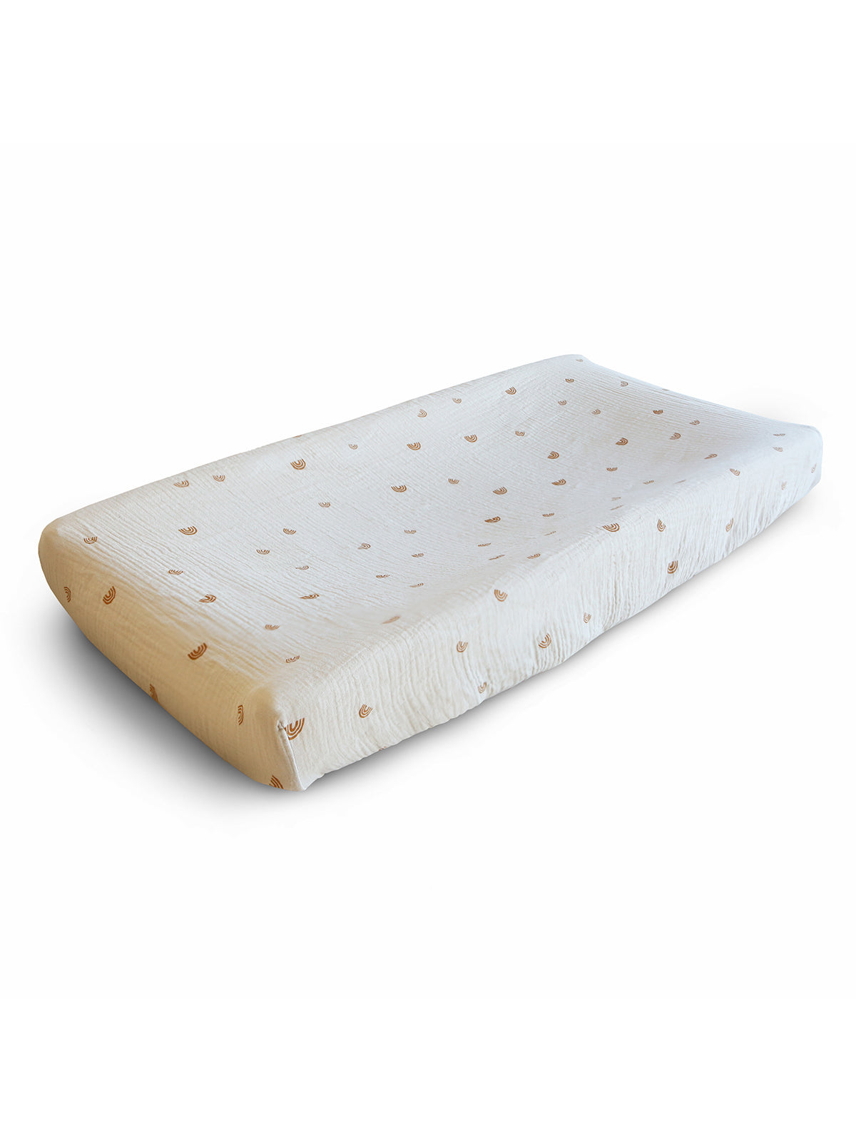 Mushie rainbow changing pad cover with colorful rainbow pattern on a soft fabric change mat.