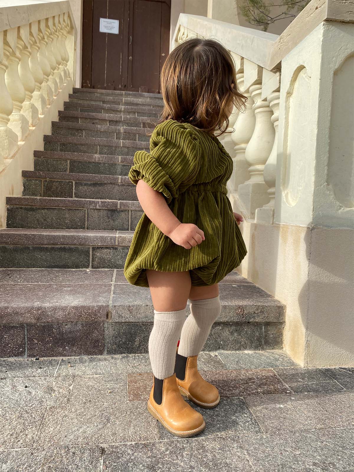 Grech & Co organic cotton over-the-knee tights in buff color, soft and comfortable with a smooth knit texture.